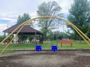 Swing set at Roszell-Exmark Park